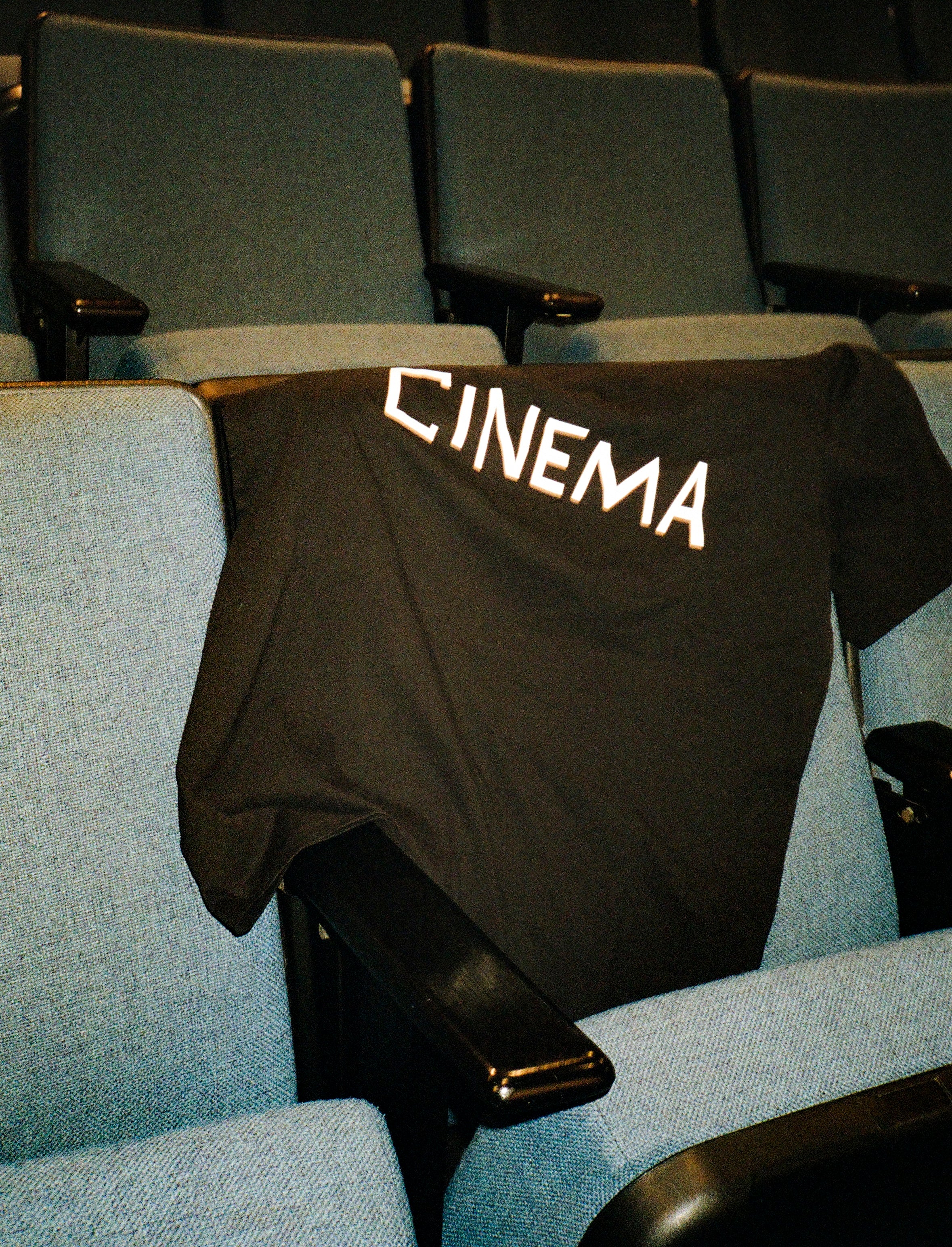 Our Canal Street Film Festival T-Shirt featuring the word Cinema on the front. 