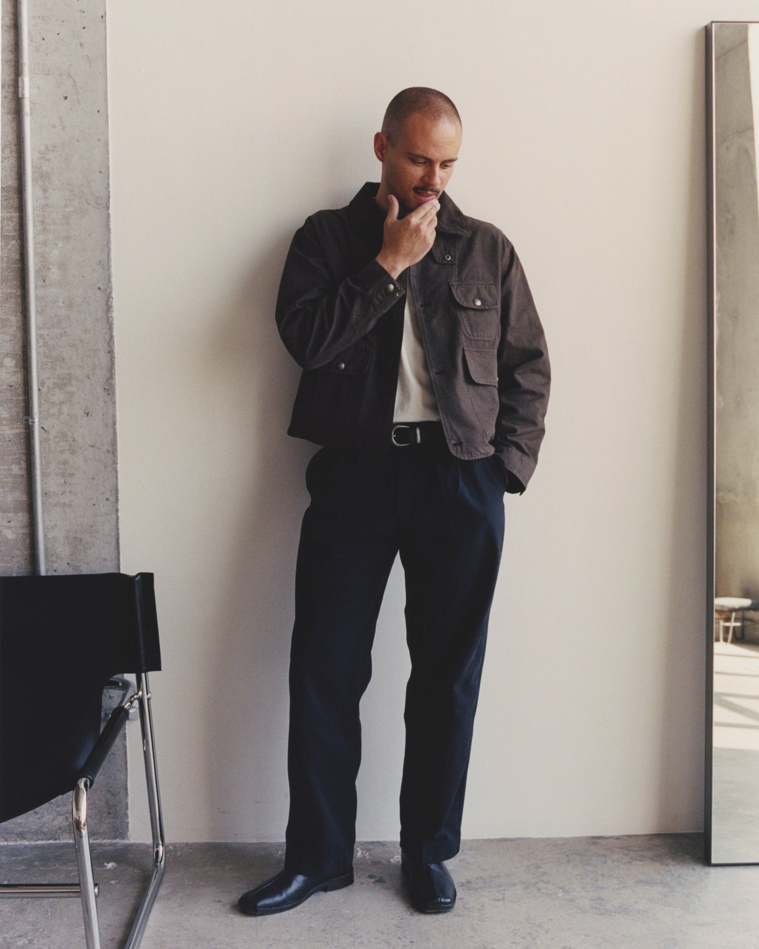Michel Oscar Monegro wearing a dark brown Knickerbocker Catskills Jacket