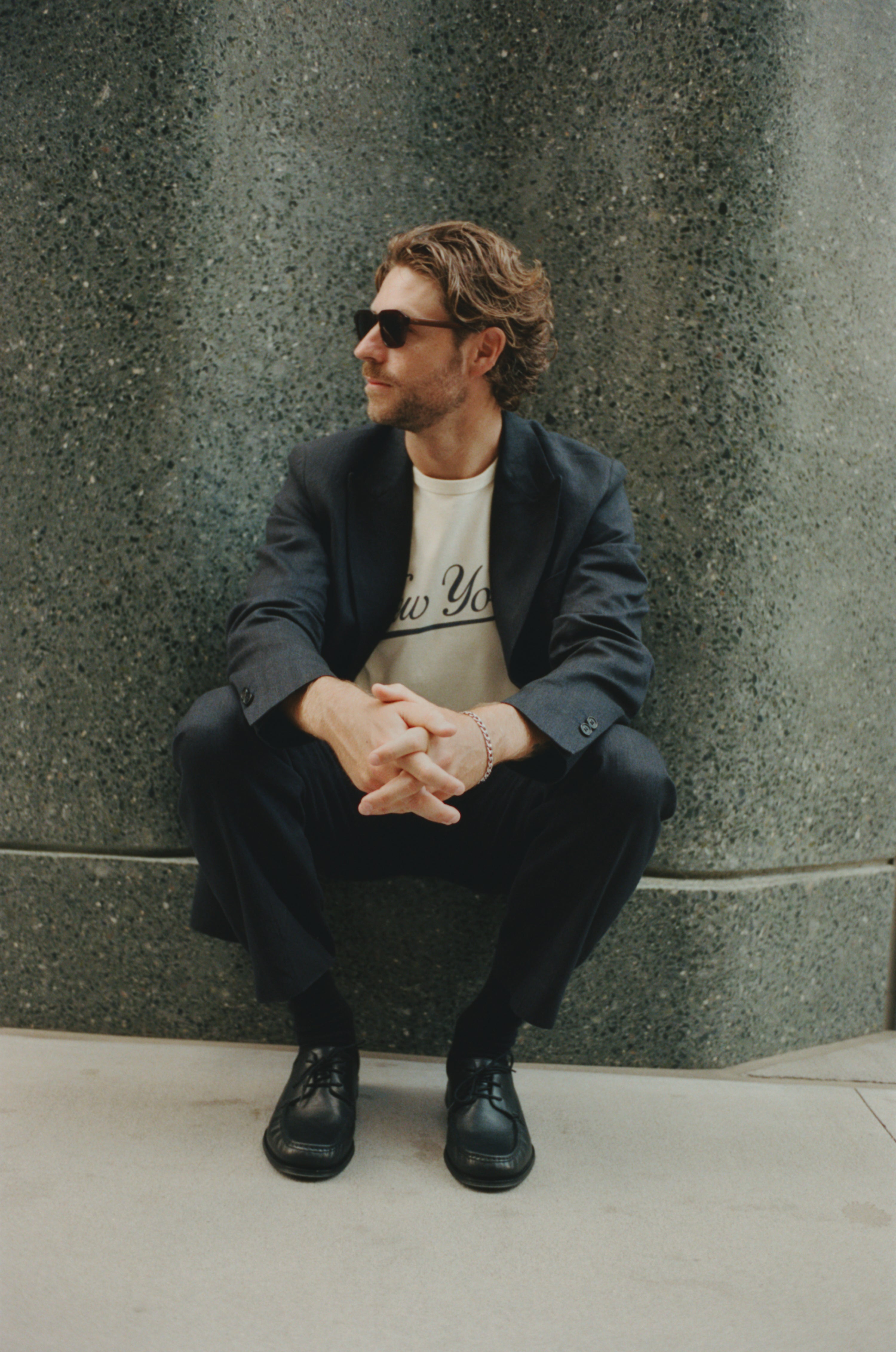 Model Wearing Black Miles Suit