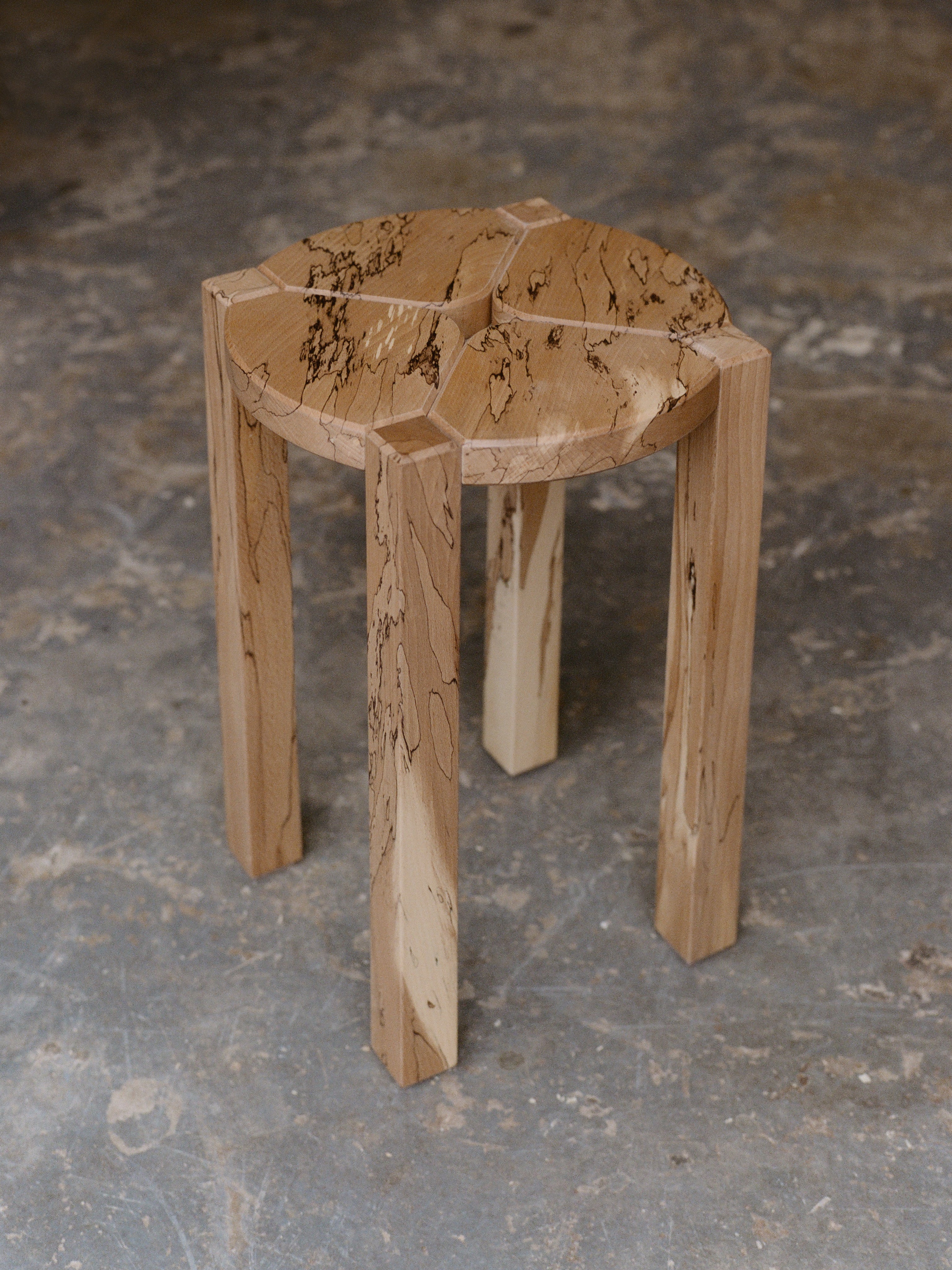 A wooden stool.